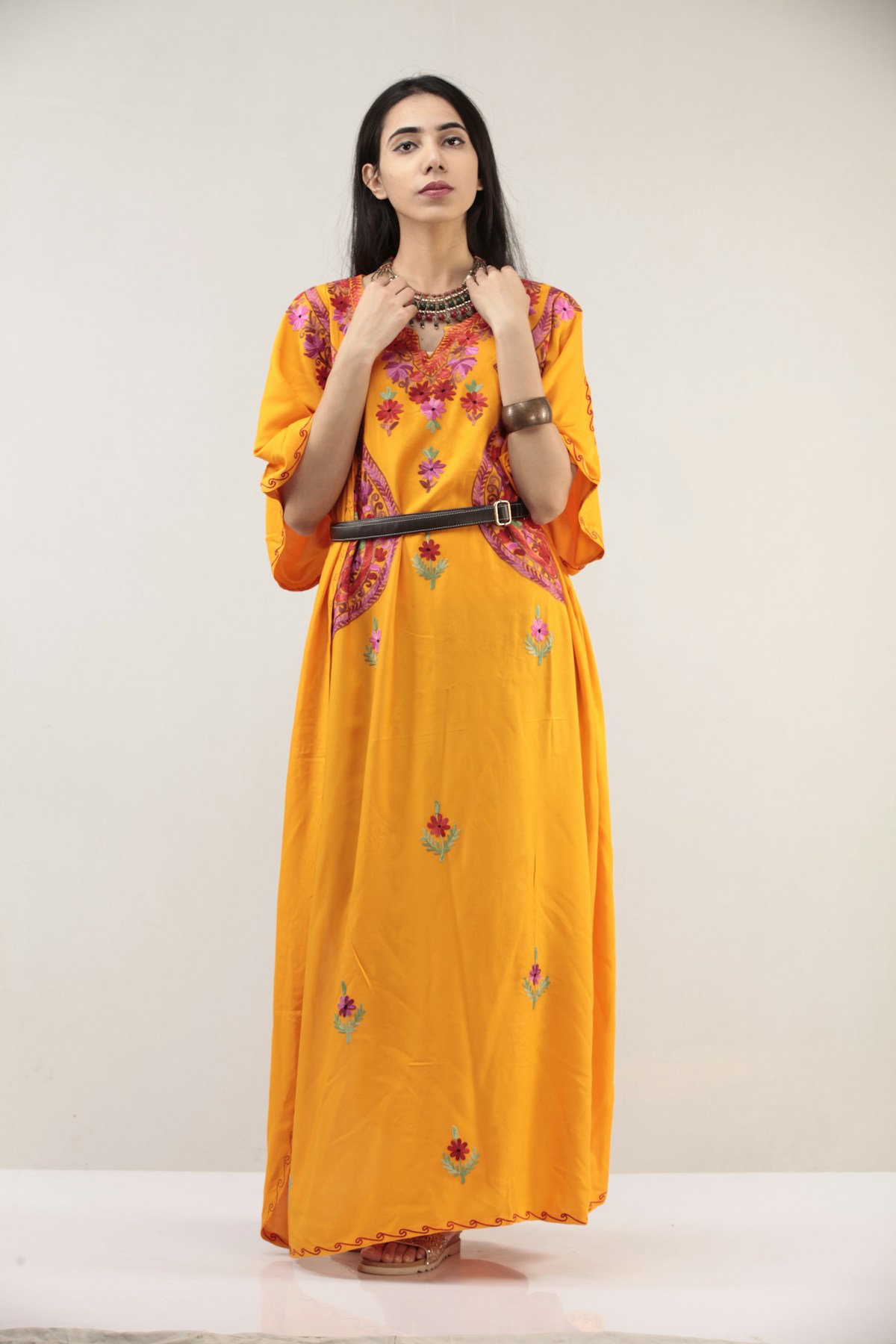 Woman wearing an elegant draped blouse